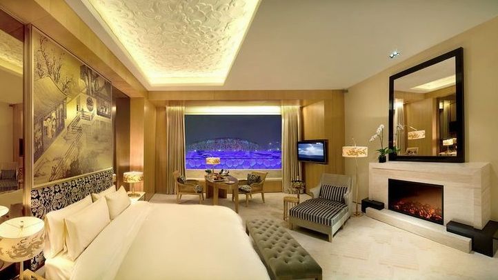 Junior suite with separate lounge area and refined casino-inspired detailing